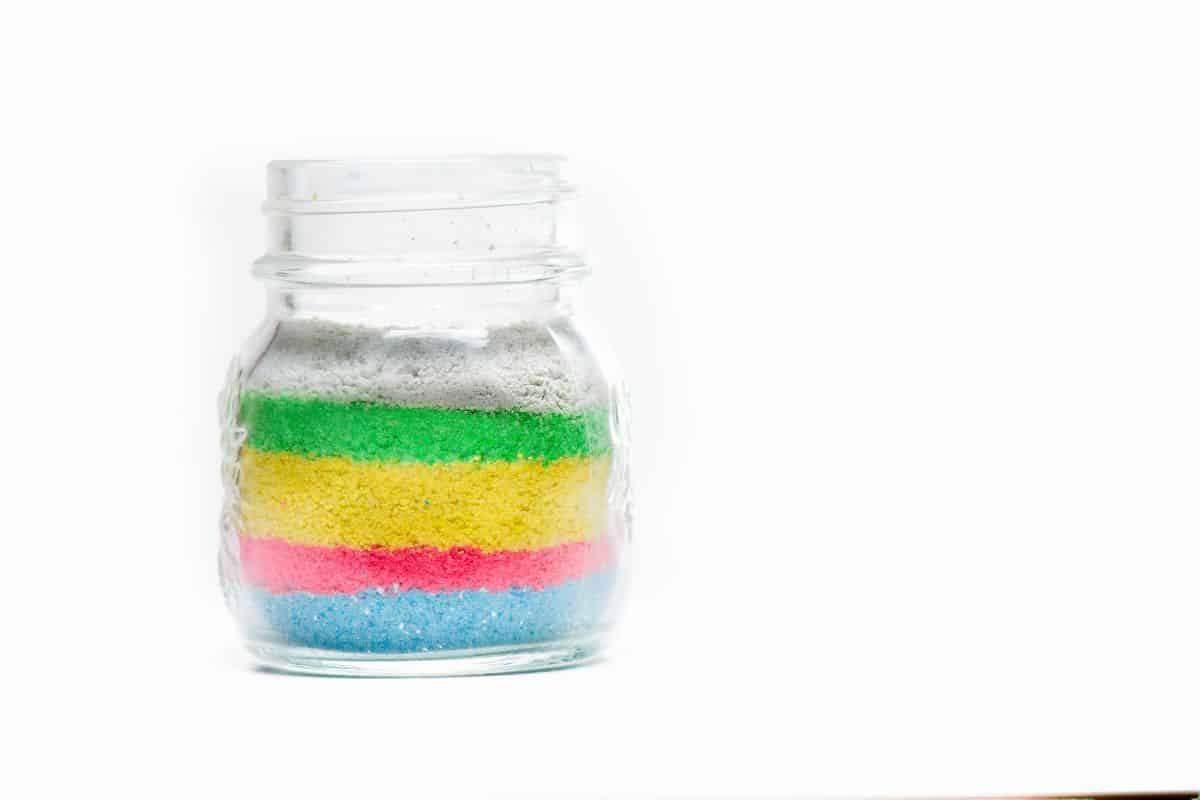 colored sand in jar